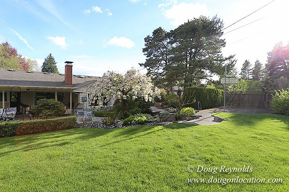 Mid Century Traditional Style Home, With a Basement, 2 car garage average sized 2 leval Back Yard with Patio and Fire Pit.