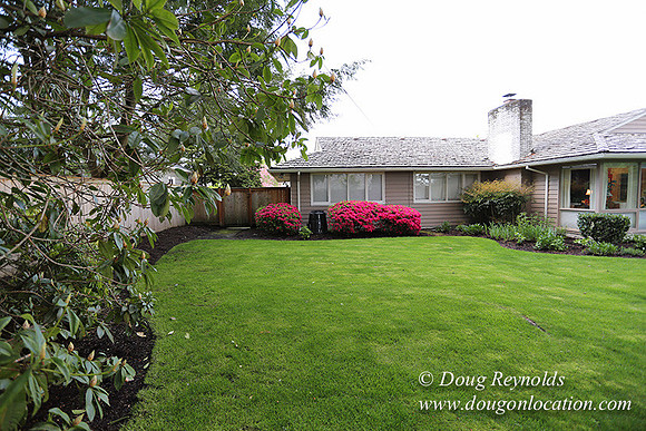 Mid Century Traditional Style Home, With a Basement, 2 car garage average sized Back Yard with Patio.