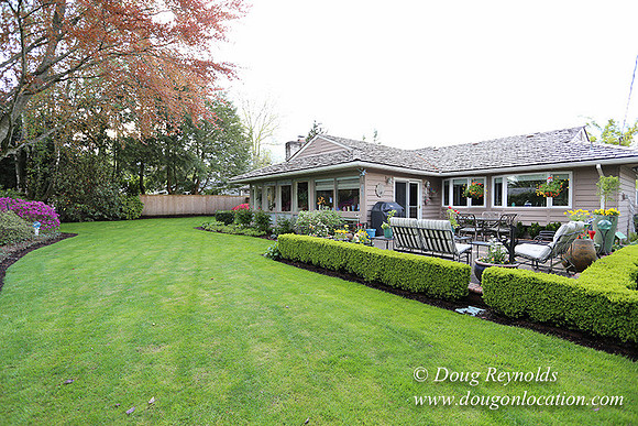 Mid Century Traditional Style Home, With a Basement, 2 car garage average sized Back Yard with Patio.
