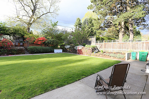 Mid Century Traditional Style Home, With a Basement, 2 car garage average sized Back Yard with Patio and Fire Pit.