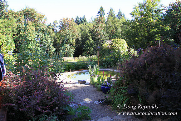 Traditional Style Home small farm with large kitchen great room, 2 story, 2 car garage on Acreage with large back yard, large front yard, garden, pond, deck, goats, bees, shop, PDX Zone