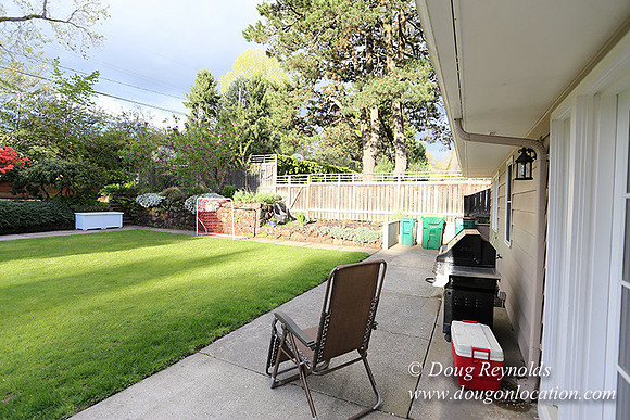 Mid Century Traditional Style Home, With a Basement, 2 car garage average sized Back Yard with Patio and Fire Pit.