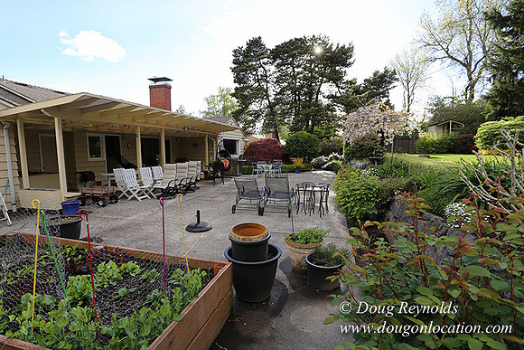 Mid Century Traditional Style Home, With a Basement, 2 car garage average sized 2 leval Back Yard with Patio and Fire Pit.