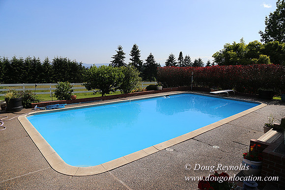 "2 Barns", "2 car garage", "40+ Acres", "PDX Zone", Pool, "White Fence", cows, "farm House", "rap around dive", "well maintained"