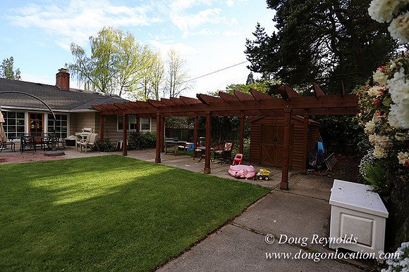 Mid Century Traditional Style Home, With a Basement, 2 car garage average sized Back Yard with Patio and Fire Pit.