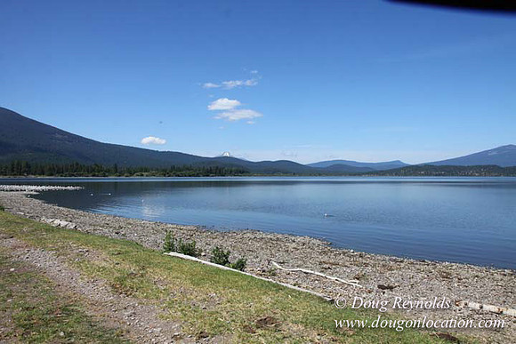 2500 Acres of green fields Creeks water crossing Bridges on a Large Lake and miles of Dirt roads Oak trees Forest land ATV Trails cows