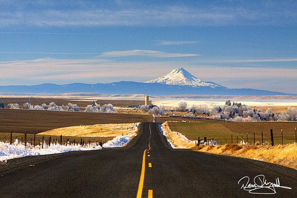 Paved 2-lane Road and Mt Hood with Snow