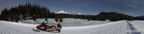 Snowmobile on Snowy Road