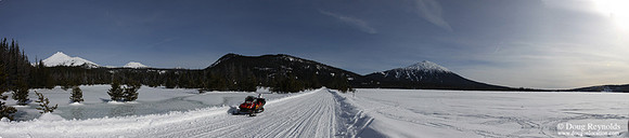 Snowmobile on Road in Mountain