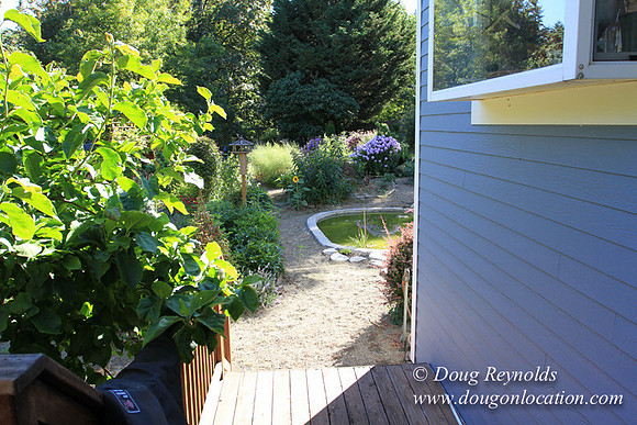 Traditional Style Home small farm with large kitchen great room, 2 story, 2 car garage on Acreage with large back yard, large front yard, garden, pond, deck, goats, bees, shop, PDX Zone