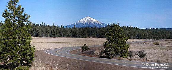 Right L-turn road with mountain