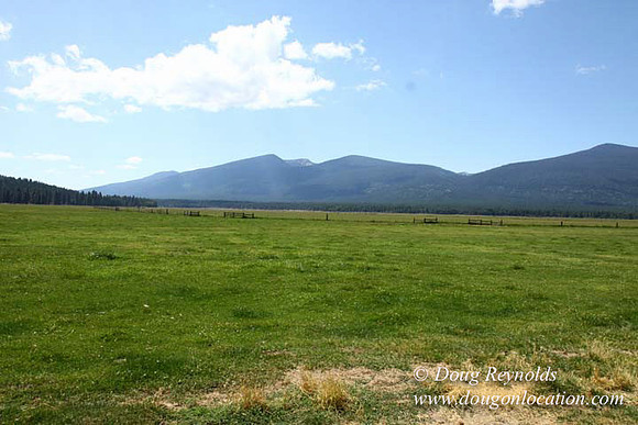 2500 Acres of green fields Creeks water crossing Bridges on a Large Lake and miles of Dirt roads Oak trees Forest land ATV Trails cows