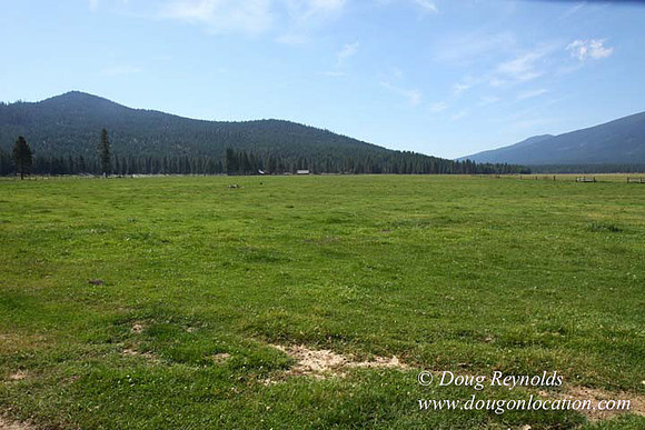 2500 Acres of green fields Creeks water crossing Bridges on a Large Lake and miles of Dirt roads Oak trees Forest land ATV Trails cows