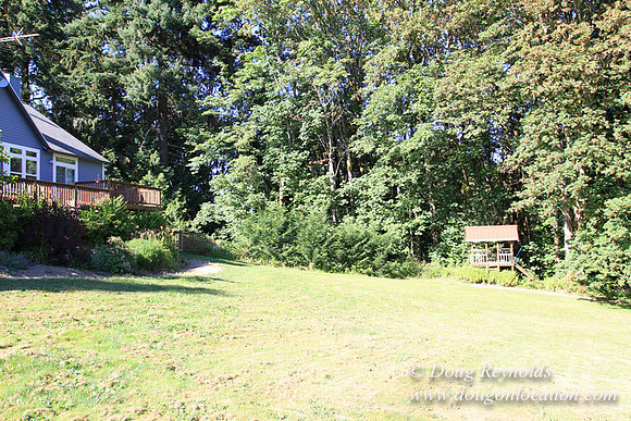 Traditional Style Home small farm with large kitchen great room, 2 story, 2 car garage on Acreage with large back yard, large front yard, garden, pond, deck, goats, bees, shop, PDX Zone