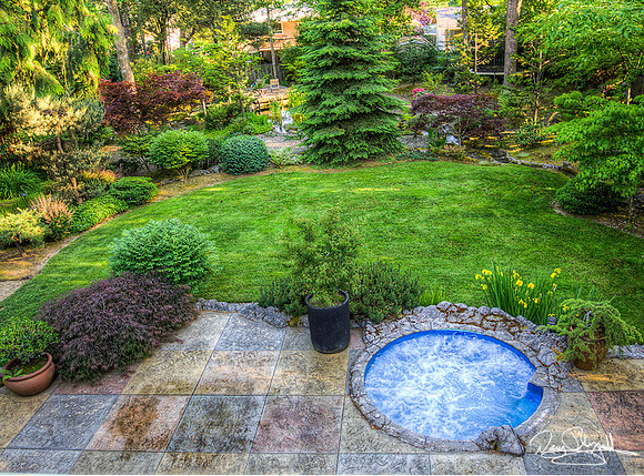 Mid Century Atomic Ranch Back Yard with Hot Tub, Patio, Small stream, and Pond with Deck well Maintained.  House photos on line soon.