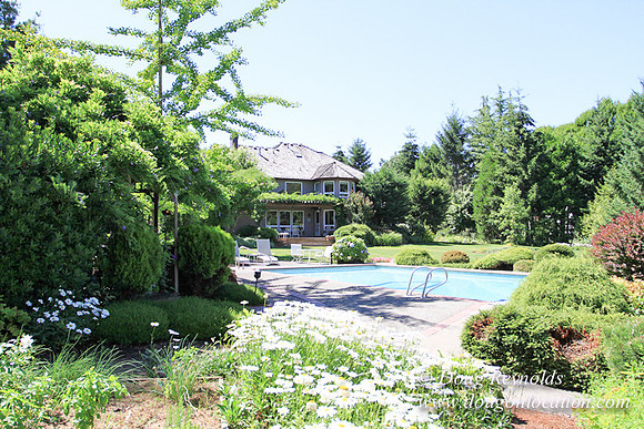 Jim’s Home Large beautiful traditional 2 story with large rooms. Modern kitchen and great room, and nook, large master suite, large entry with French doors. Well maintained grounds and garden, with la