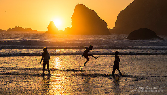 Silhouetted Kids Beach Sunset