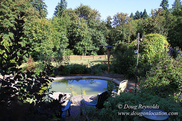 Traditional Style Home small farm with large kitchen great room, 2 story, 2 car garage on Acreage with large back yard, large front yard, garden, pond, deck, goats, bees, shop, PDX Zone