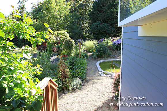 Traditional Style Home small farm with large kitchen great room, 2 story, 2 car garage on Acreage with large back yard, large front yard, garden, pond, deck, goats, bees, shop, PDX Zone