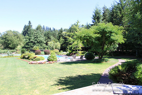 Jim’s Home Large beautiful traditional 2 story with large rooms. Modern kitchen and great room, and nook, large master suite, large entry with French doors. Well maintained grounds and garden, with la