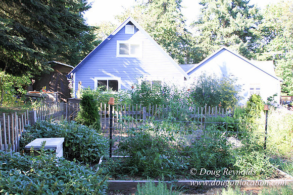 Traditional Style Home small farm with large kitchen great room, 2 story, 2 car garage on Acreage with large back yard, large front yard, garden, pond, deck, goats, bees, shop, PDX Zone