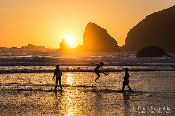 Silhouetted Kids Beach Sunset