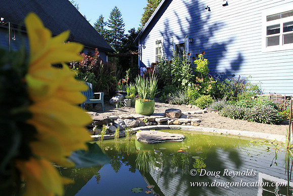 Traditional Style Home small farm with large kitchen great room, 2 story, 2 car garage on Acreage with large back yard, large front yard, garden, pond, deck, goats, bees, shop, PDX Zone