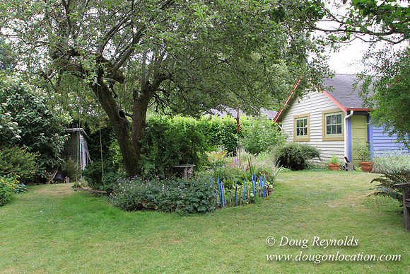 Laura’s Home This is a Portland Bungalow Style small home with a average sized and interesting back yard, nice garden with bee hive’s