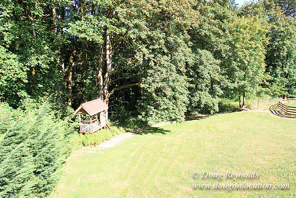 Traditional Style Home small farm with large kitchen great room, 2 story, 2 car garage on Acreage with large back yard, large front yard, garden, pond, deck, goats, bees, shop, PDX Zone