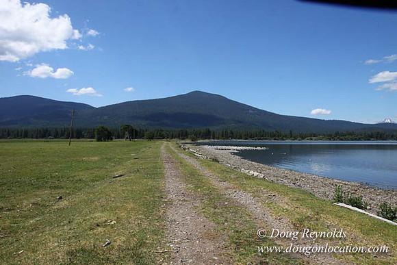 2500 Acres of green fields Creeks water crossing Bridges on a Large Lake and miles of Dirt roads Oak trees Forest land ATV Trails cows