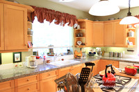 Traditional Style Home small farm with large kitchen great room, 2 story, 2 car garage on Acreage with large back yard, large front yard, garden, pond, deck, goats, bees, shop, PDX Zone