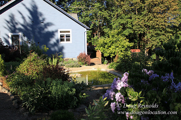 Traditional Style Home small farm with large kitchen great room, 2 story, 2 car garage on Acreage with large back yard, large front yard, garden, pond, deck, goats, bees, shop, PDX Zone