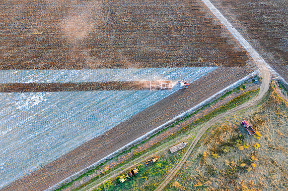 Drone over plowed fields