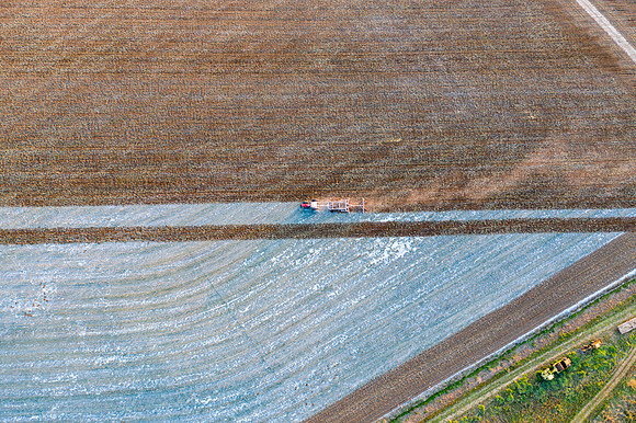 Drone over plowed fields