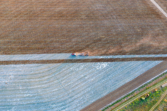 Drone over plowed fields
