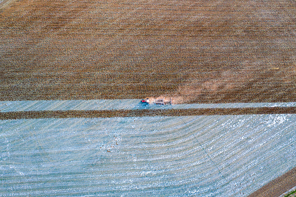 Drone over plowed fields
