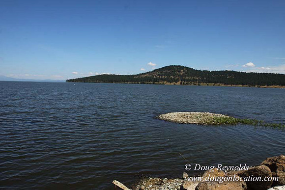 2500 Acres of green fields Creeks water crossing Bridges on a Large Lake and miles of Dirt roads Oak trees Forest land ATV Trails cows