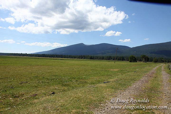 2500 Acres of green fields Creeks water crossing Bridges on a Large Lake and miles of Dirt roads Oak trees Forest land ATV Trails cows