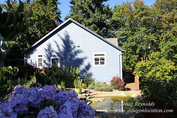 Traditional Style Home small farm with large kitchen great room, 2 story, 2 car garage on Acreage with large back yard, large front yard, garden, pond, deck, goats, bees, shop, PDX Zone