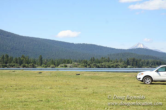 2500 Acres of green fields Creeks water crossing Bridges on a Large Lake and miles of Dirt roads Oak trees Forest land ATV Trails cows