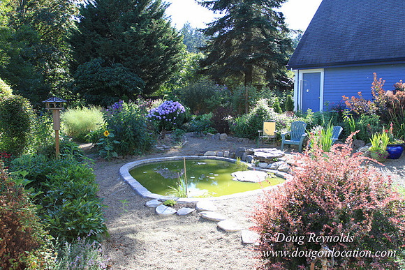 Traditional Style Home small farm with large kitchen great room, 2 story, 2 car garage on Acreage with large back yard, large front yard, garden, pond, deck, goats, bees, shop, PDX Zone