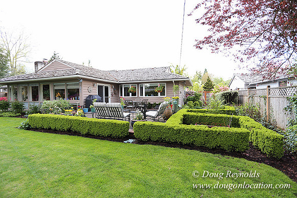 Mid Century Traditional Style Home, With a Basement, 2 car garage average sized Back Yard with Patio.