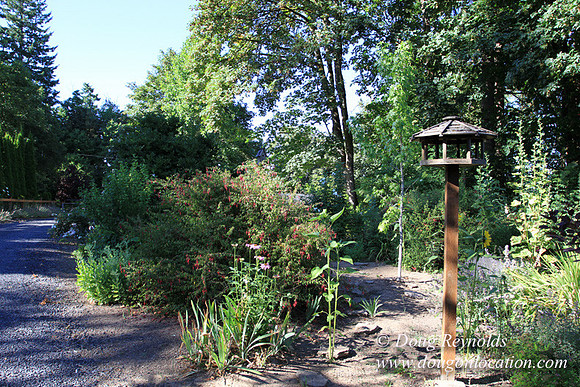 Traditional Style Home small farm with large kitchen great room, 2 story, 2 car garage on Acreage with large back yard, large front yard, garden, pond, deck, goats, bees, shop, PDX Zone
