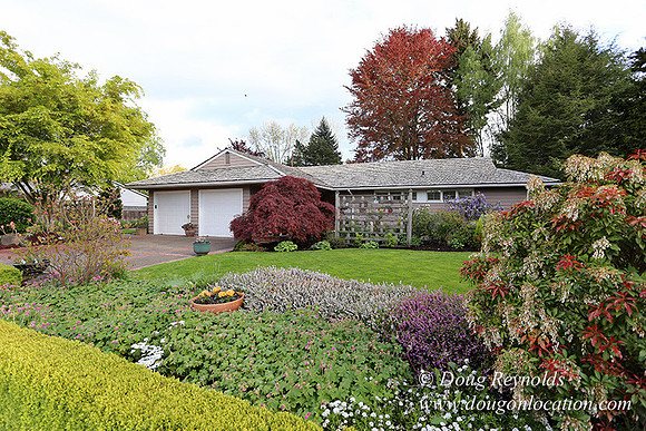 Mid Century Traditional Style Home, With a Basement, 2 car garage average sized Back Yard with Patio.