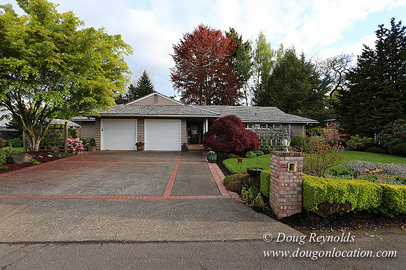 Mid Century Traditional Style Home, With a Basement, 2 car garage average sized Back Yard with Patio.