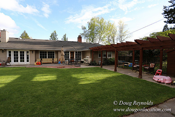 Mid Century Traditional Style Home, With a Basement, 2 car garage average sized Back Yard with Patio and Fire Pit.