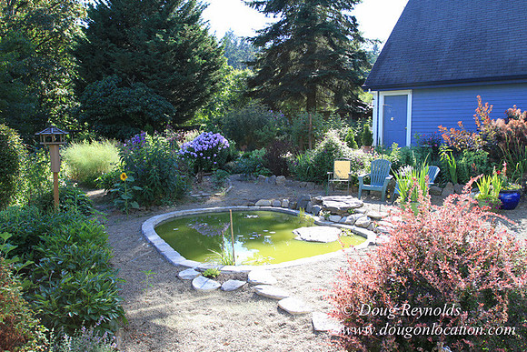 Traditional Style Home small farm with large kitchen great room, 2 story, 2 car garage on Acreage with large back yard, large front yard, garden, pond, deck, goats, bees, shop, PDX Zone