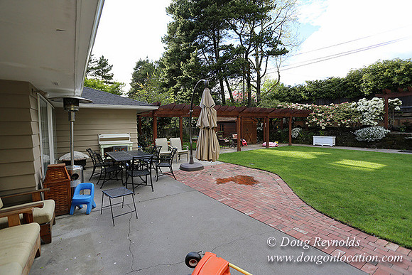 Mid Century Traditional Style Home, With a Basement, 2 car garage average sized Back Yard with Patio and Fire Pit.