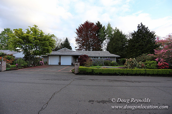 Mid Century Traditional Style Home, With a Basement, 2 car garage average sized Back Yard with Patio.