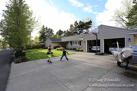Mid Century Traditional Style Home, With a Basement, 2 car garage average sized Back Yard with Patio and Fire Pit.